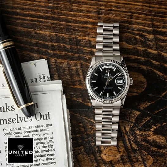 Rolex Day-Date 228238 "Yellow Gold Fluted Bezel" Detailed Replica rolex 18239 black replica Rolex Day-Date 118239 Replica on the table