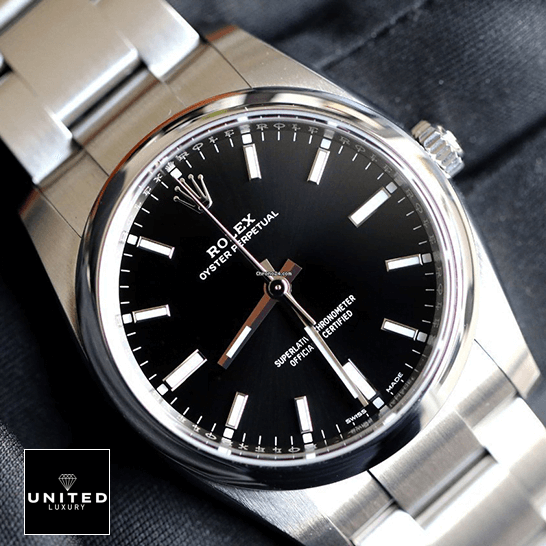 Rolex Oyster Perpetual Automatic Black Dial 114200 Signature Replica 1:1 rolex oyster perpetual 14200 0023 replica tiltedleft Rolex Oyster 14200-0023 Replica stainless steel