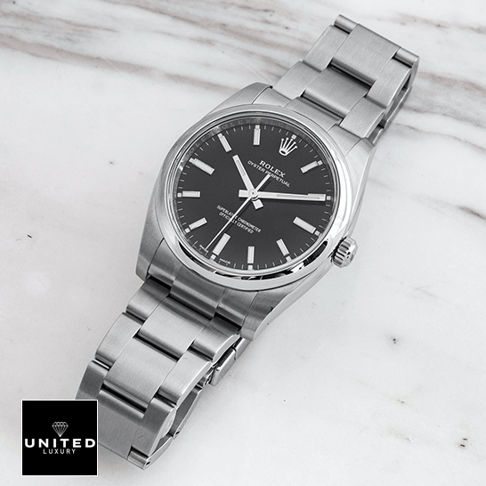 Rolex Oyster Perpetual Automatic Black Dial 114200 Signature Replica 1:1 rolex oyster perpetual 14200 0023 replica tiltedright Rolex Oyster Perpetual 14200-0023 Replica white background